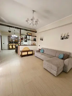 a living room with a couch and a table at La Casa Di Ady in Palermo