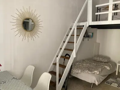 a white staircase in a room with a mirror at Casteldaccia Stay, mieszkanko Kingi in Casteldaccia