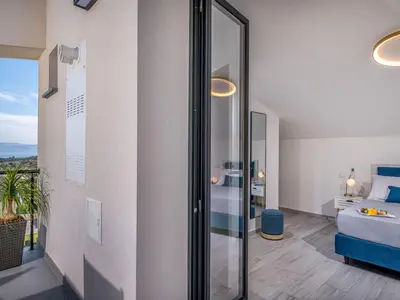 a room with a glass door leading to a bedroom at Apartment Attico Dolce Vista by Interhome in Castellammare del Golfo