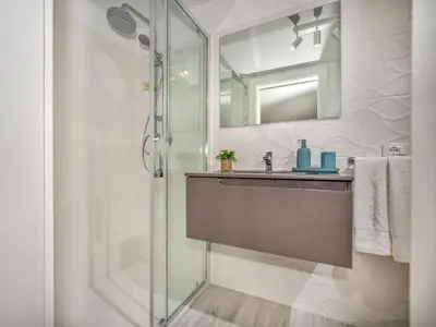 a bathroom with a sink and a shower at Apartment Attico Dolce Vista by Interhome in Castellammare del Golfo