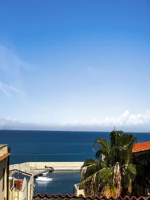 a view of the ocean from a building at Onda Blu Apartment in Balestrate