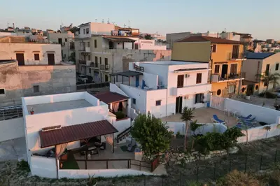 an aerial view of a city with buildings at Baia Marina Oasi in Balestrate