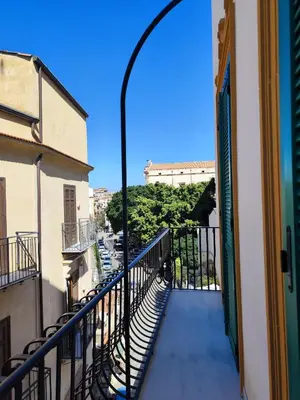 a balcony with a view of a street at Brunaccini Apartment in Palermo