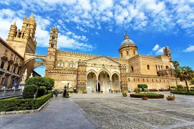 a large stone building with a dome on top at Casa Amato appartamento alla zisa in Palermo