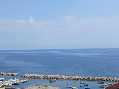 an aerial view of a harbor with boats in the water at Sonalerba Ammare Trabia H H in Trabia