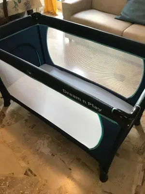 a black and white bed frame with a couch at Villa Globo Mondello in Palermo
