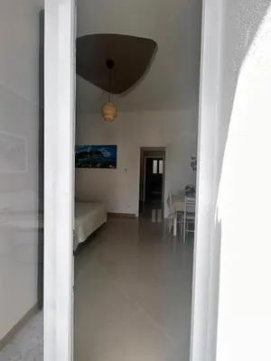 a hallway with a room with a bed and a ceiling at Zisa Apartment Palermo in Palermo