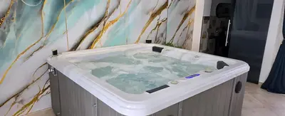 a large bath tub in a bathroom at The Moon Suite in Palermo