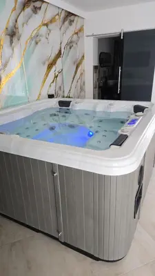 a jacuzzi tub in a room at The Moon Suite in Palermo