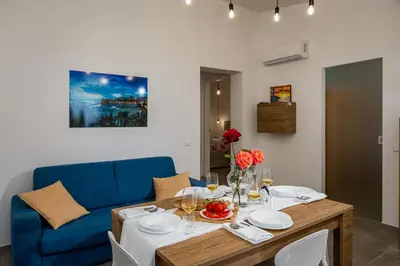a bedroom with a bed with towels on it at Villa Paradise Luxury in Castellammare del Golfo