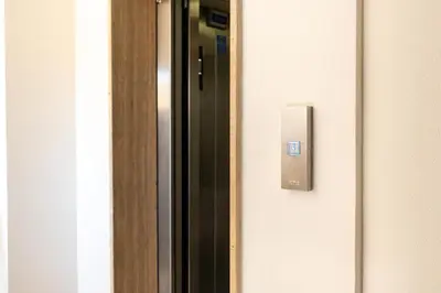 a close up of a door with a light switch at Le Case del Massimo in centrocittà in Palermo