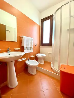 a kitchen and dining room with a table and chairs at Residence Piana, San Vito Lo Capo in San Vito lo Capo