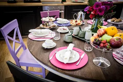 a table with plates of food and fruit on it at BB 22 Palace in Palermo