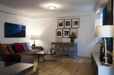 a living room with a couch and a table at BB 22 Palace in Palermo