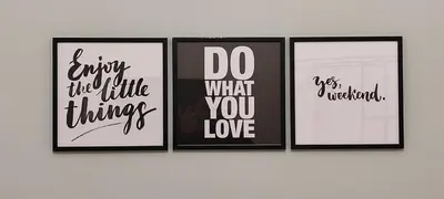 a group of four framed pictures on a wall at Charme Rooms Palermo-By E&K in Palermo