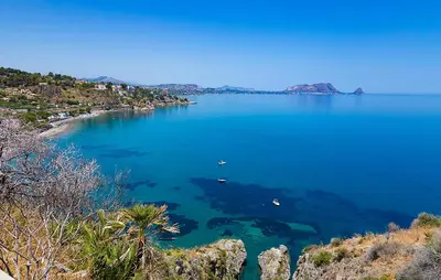 a large blue body of water with boats in it at Nice Apartment In Palermo in Palermo
