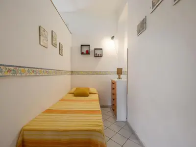 a bedroom with a bed in a room at Apartment Cicladi Leros by Interhome in Santa Flavia