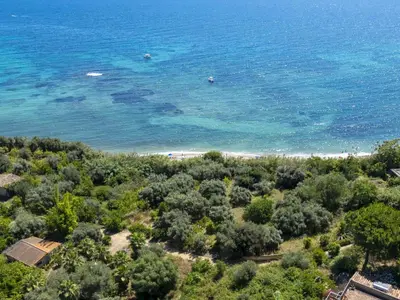 an aerial view of a beach and the ocean at Apartment Cicladi Santorini by Interhome in Santa Flavia