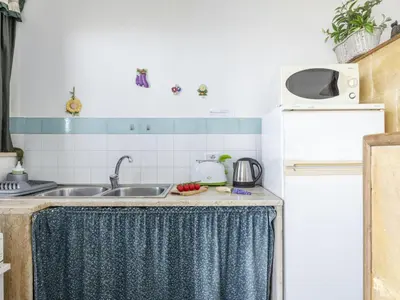 a kitchen with a sink and a refrigerator at Apartment Cicladi Kea by Interhome in Santa Flavia