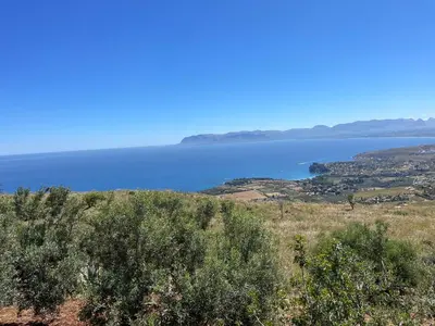 a view of a large body of water at Lally in the Sky moderno monovano panoramico ed accessoriato in Scopello