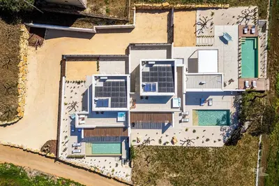 an overhead view of a house with solar panels on it at Villa Castello in Balestrate
