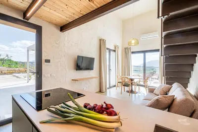 a kitchen with a counter with fruits and vegetables on it at Villa Castello in Balestrate