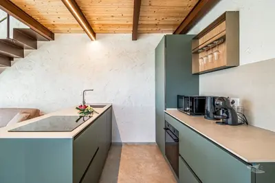 a kitchen with a sink and a counter top at Villa Castello in Balestrate