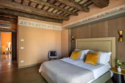 a bedroom with a large bed in a room at Palazzo De Gregorio - Apartments in Palermo