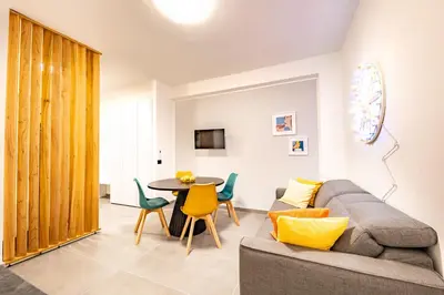 a living room with a couch and a table at Casa Chicotta- Libertà in Palermo
