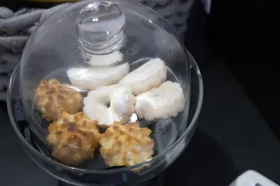a bunch of donuts are in a food processor at Dimora Garibaldi in Palermo