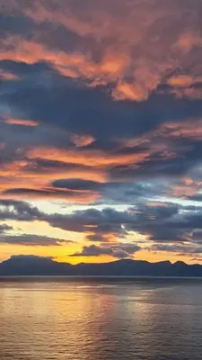 a sunset over a large body of water at Casa Kialy in Terrasini