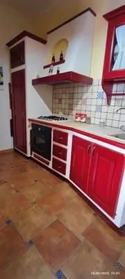 a bathroom with a toilet and a shower and a sink at casa Fontana in Capaci