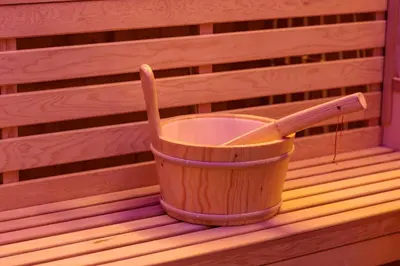 a bucket with a spoon in it sitting on a bench at A' Casuzza Suite Room in Porticello