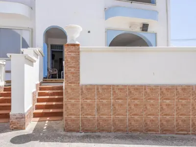 a brick wall in front of a house at Apartment Pietra Marina by Interhome in Balestrate