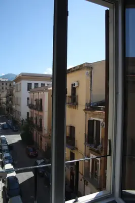 a view of a city street from a window at Targa Moto Art in Palermo