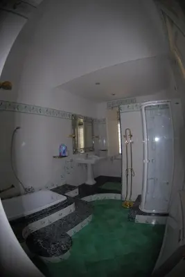a bathroom with a tub and a shower and a sink at Villa 7 Palms Mondello Palermo Sicily in Palermo