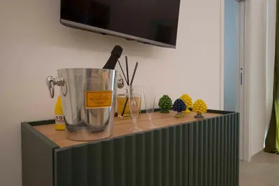 a counter top with a blender on top of it at Massimo Rooms and suite in Palermo