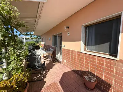 an outside view of a house with a window at Villa Belvedere in Partinico