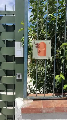 a sign on the side of a building at Villa Clori in Trabia