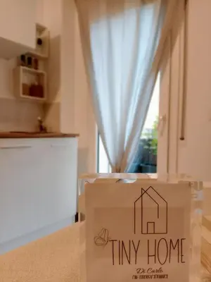 a box sitting on a kitchen counter with a tiny home sign at Tiny Home Di Carlo in Palermo