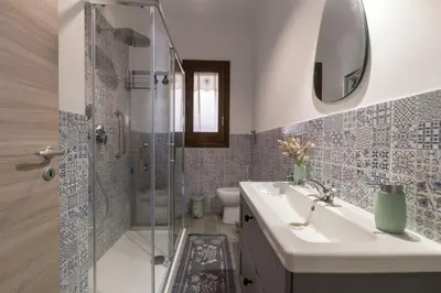 a bathroom with a sink and a shower at Appartamento La Loggetta a pochi metri dalla spiaggia di San Vito Lo Capo in San Vito lo Capo