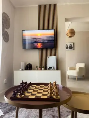 a living room with a chessboard on a table at Casa Tulum - Sea View & Breakfast in Palermo