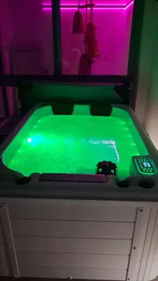 a pool of green water in a room at Sunrise in Santa Flavia