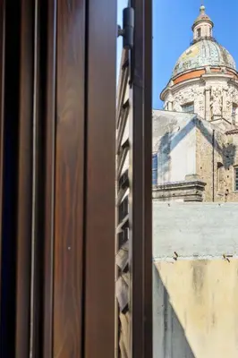 a view of a building from a window at Prospettiva Ballarò - Sotto la cupola in Palermo