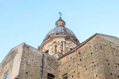 an old building with a dome on top of it at Prospettiva Ballarò - Sotto la cupola in Palermo