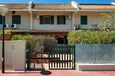 a gate in front of a house at Clizia Holiday in Campofelice di Roccella