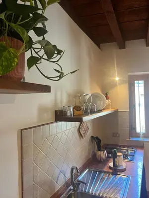 a kitchen with a sink and a counter top at Casa Teré in Palermo