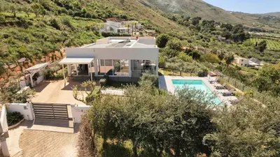 an aerial view of a house with a swimming pool at Villa Amelia in Castellammare del Golfo