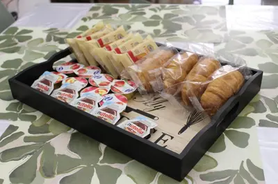 a tray of sandwiches and other food on a table at Talitha in Palermo