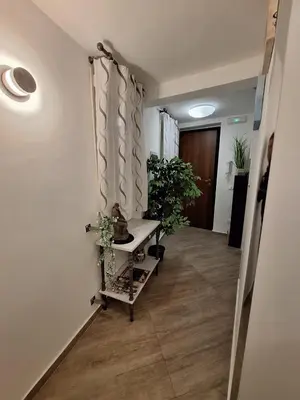a hallway with potted plants in a room at Cattedrale Superior Room plus Terrace Palermo in Palermo